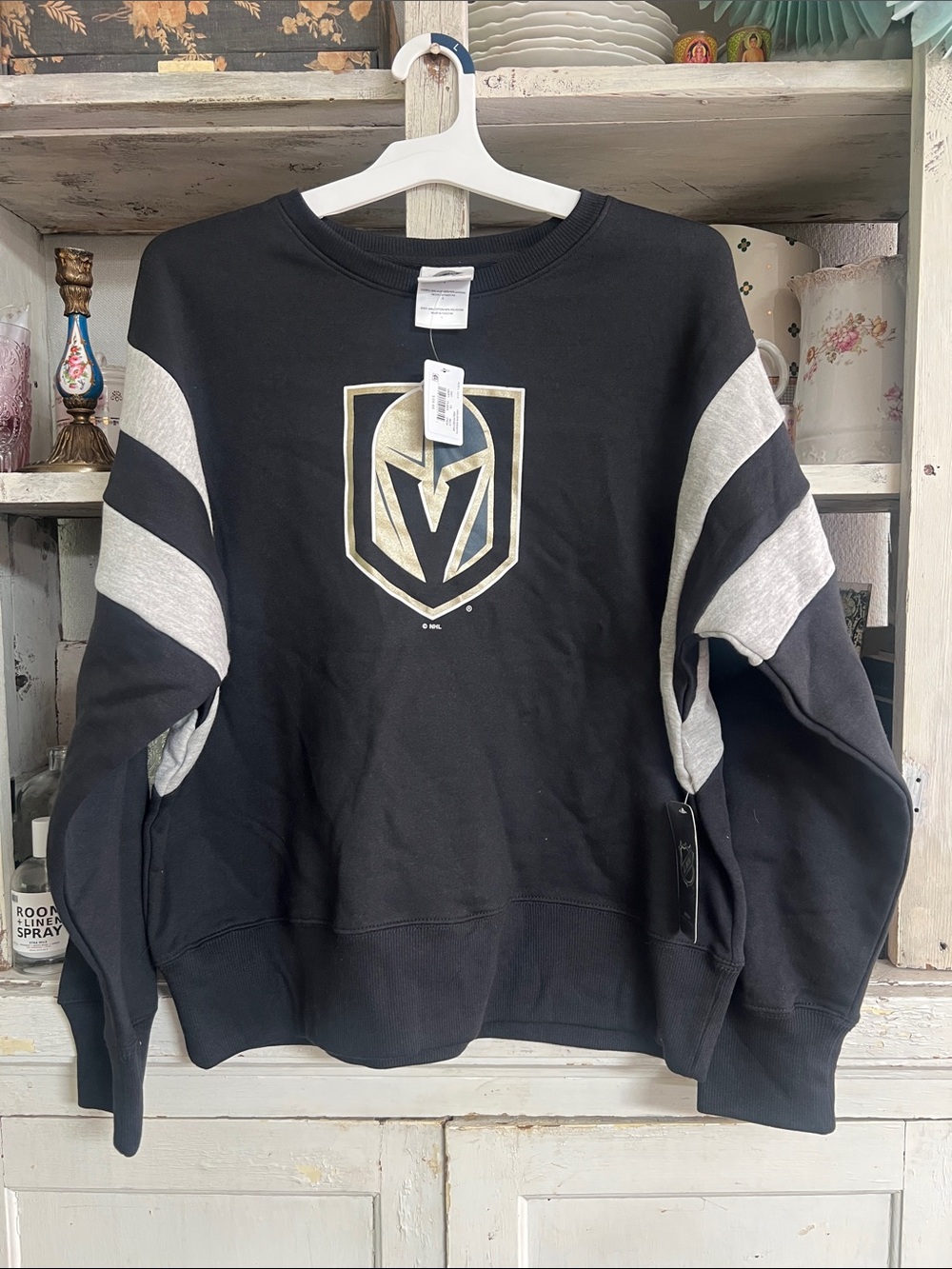 NHL Golden Knights Black Crewneck Sweatshirt Gold Crest and Gray Sleeve Stripes